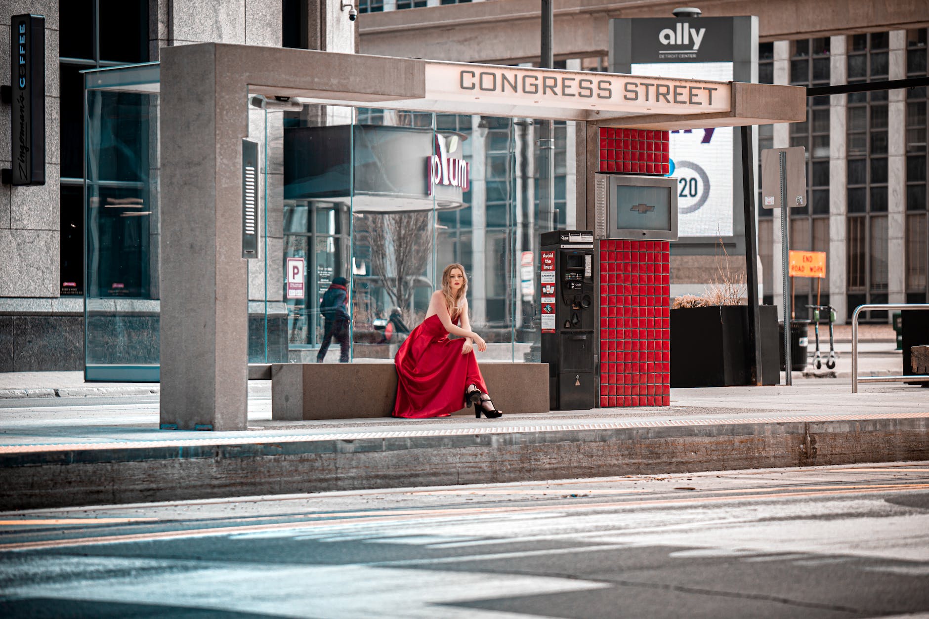 girl at a bus stop